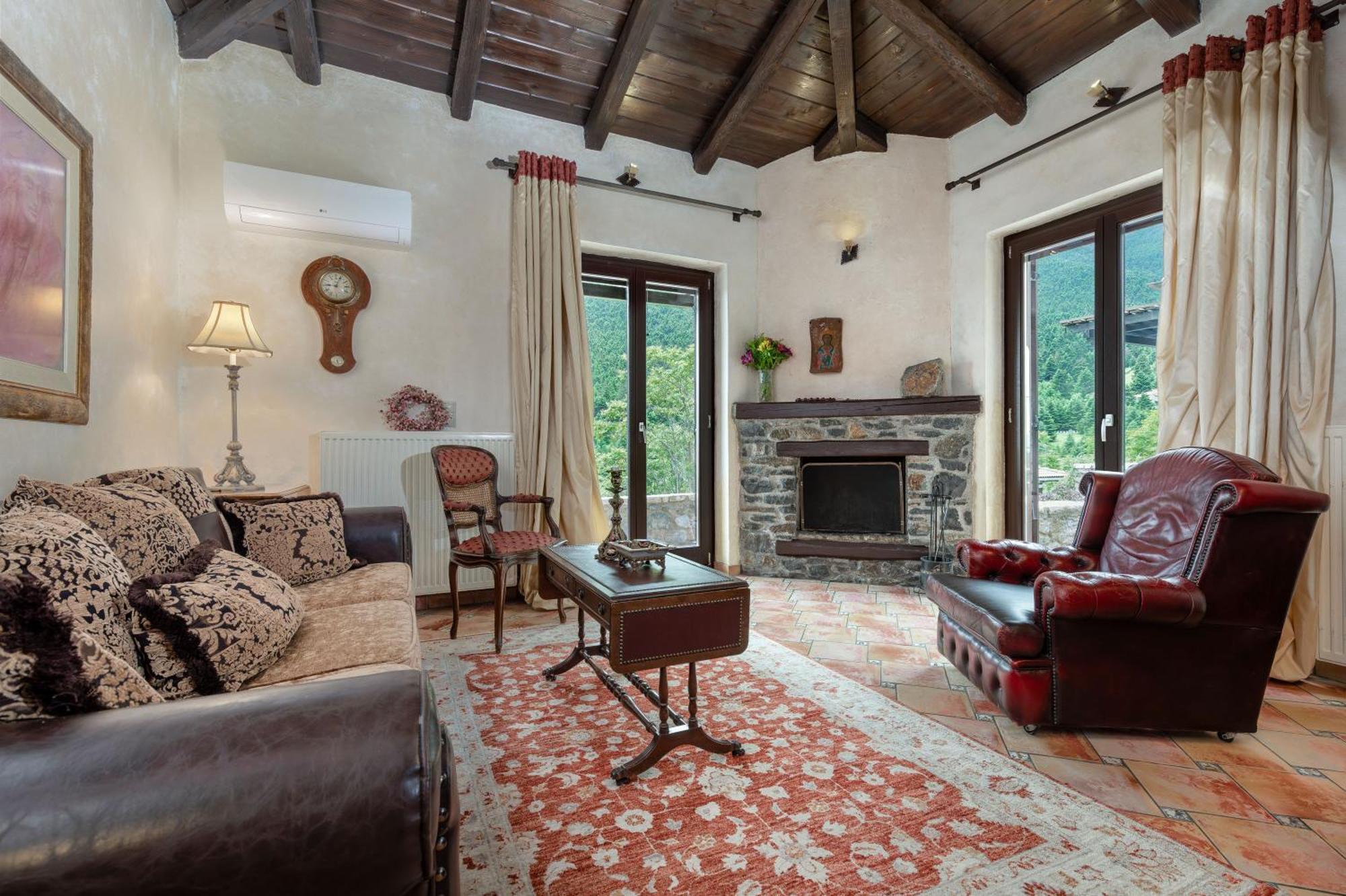 Ostra Menalon Luxury Suites Kardharás Quarto foto